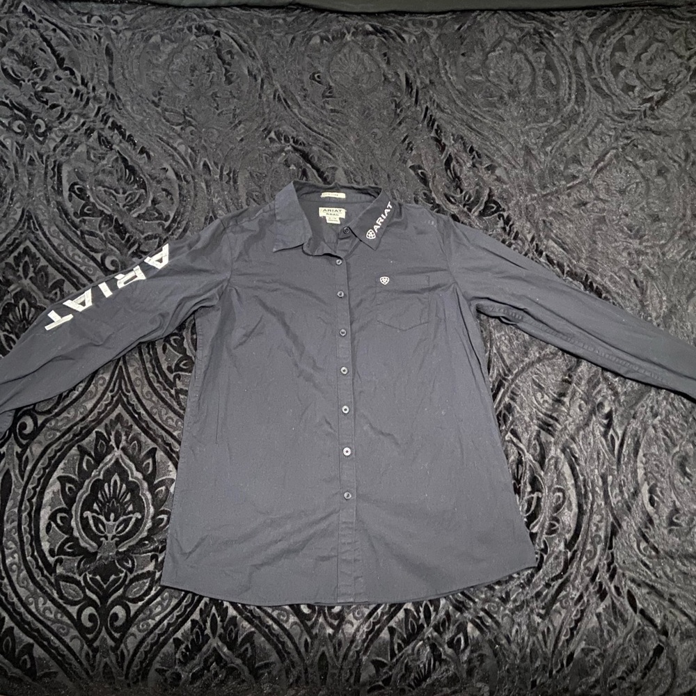 This is an Ariat shirt size Xl for women